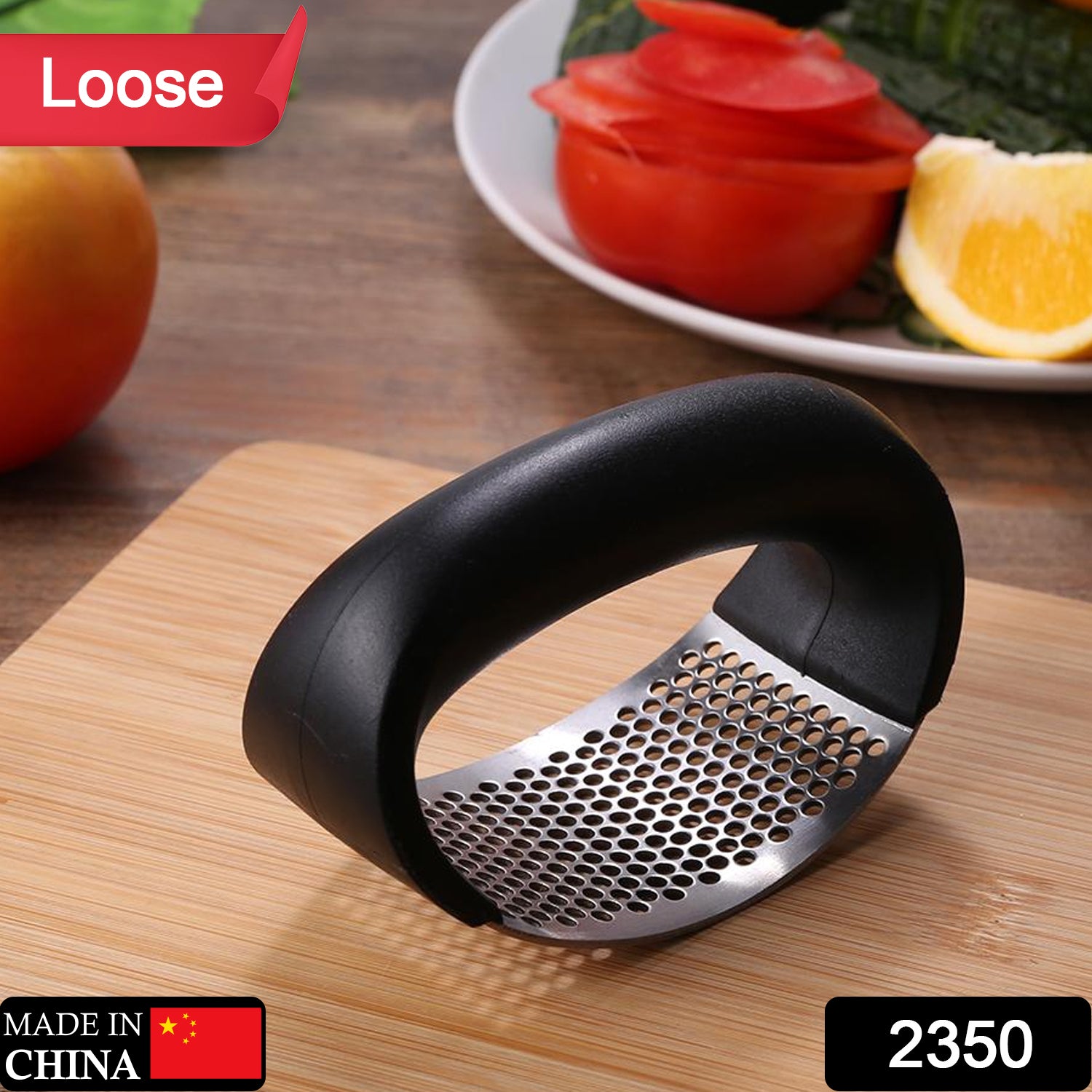 Wukusy stainless steel garlic presser and ginger crusher, versatile kitchen tool for quick and easy garlic and ginger crushing.
