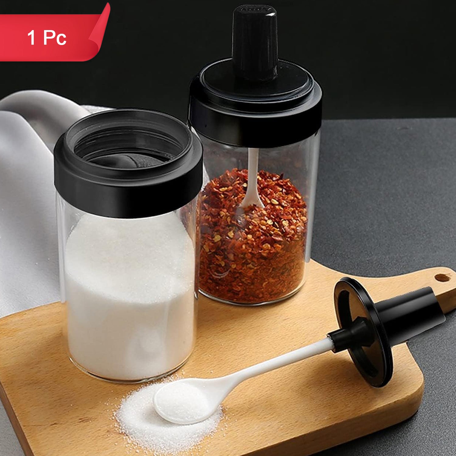 Wukusy spice box with clear glass jars for storing spices and seasonings, versatile kitchen tool for organized cooking.