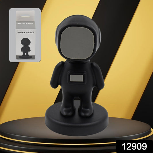 Wukusy astronaut cartoon magnetic mobile phone holder for car dashboard, 360-degree rotation, compatible with all smartphones.