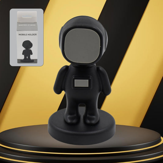 Wukusy astronaut cartoon magnetic mobile phone holder for car dashboard, 360° rotating, compatible with all smartphones.