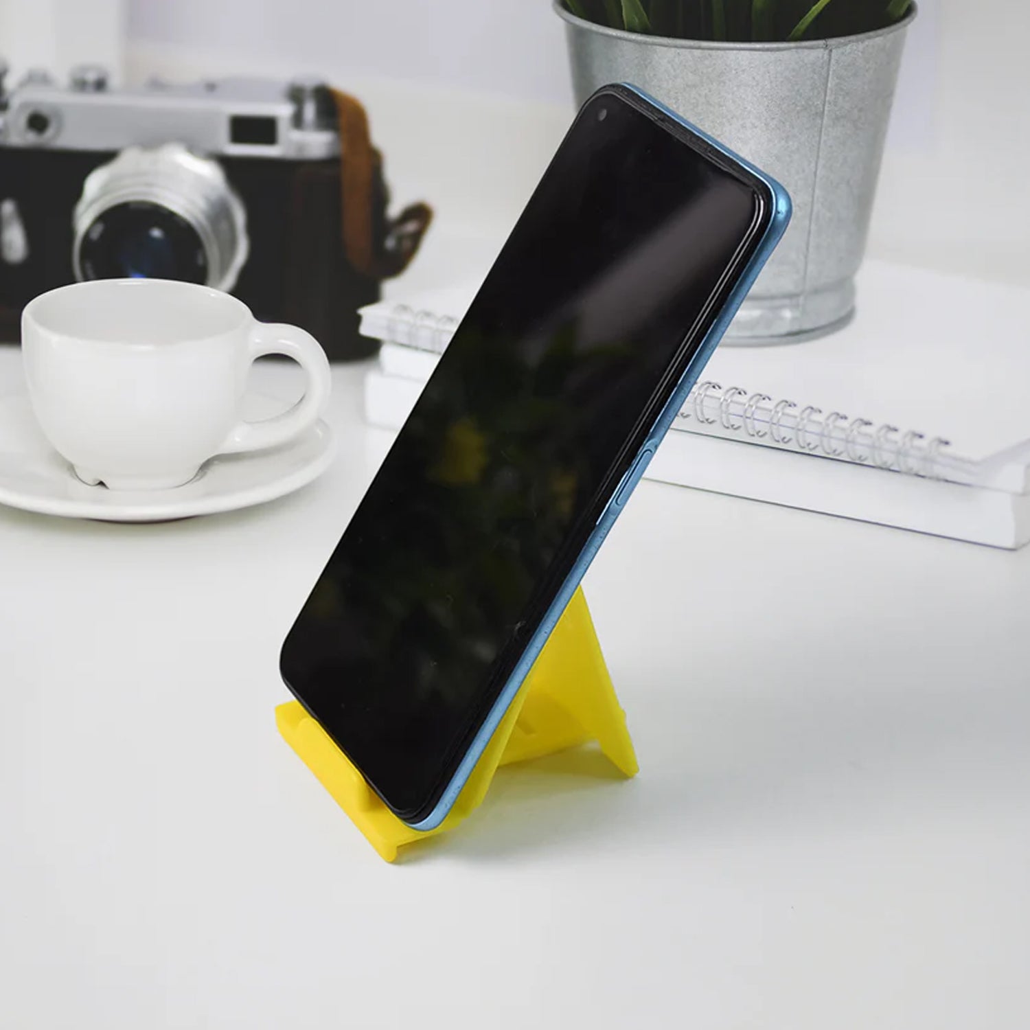 Six Wukusy adjustable foldable plastic mobile phone stands in mixed colors, perfect for hands-free viewing and easy portability.