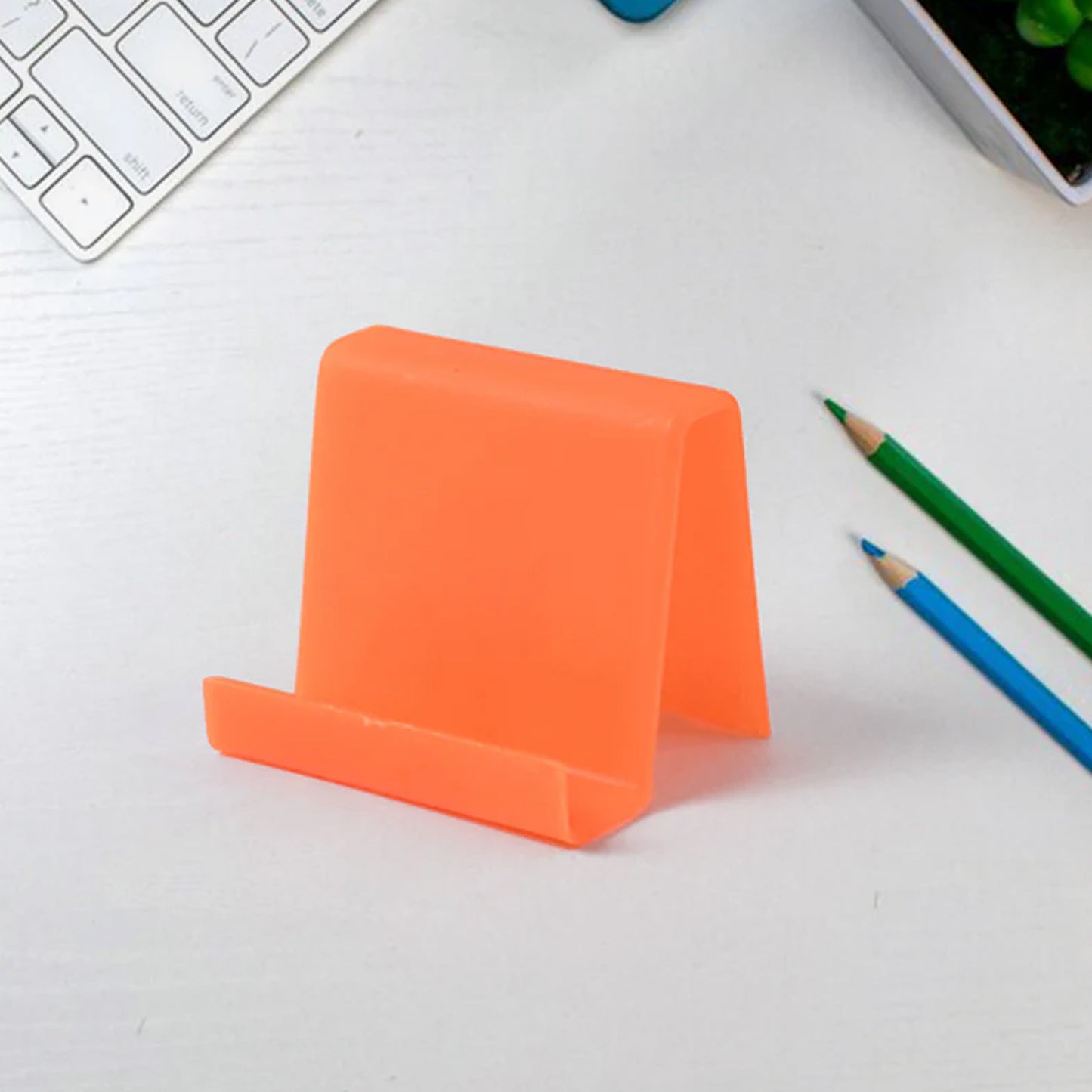 Two Wukusy durable plastic mobile phone stands with angled support in mixed colors, ideal for hands-free viewing and stability.