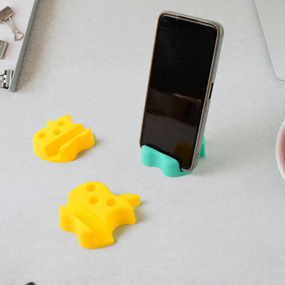 Set of three Wukusy apple-shaped plastic mobile stands with pen holders in mixed colors, ideal for organizing your phone and stationery.