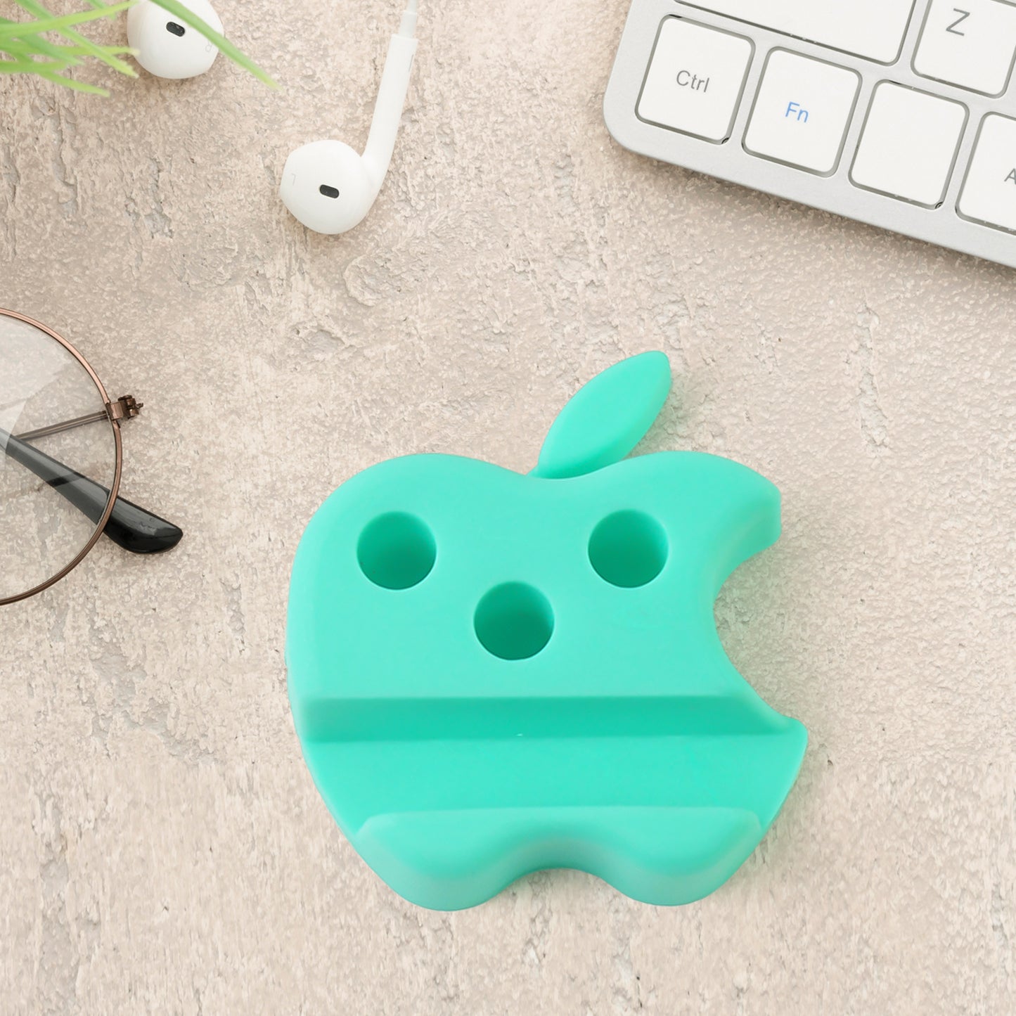 Set of three Wukusy apple-shaped plastic mobile stands with pen holders in mixed colors, ideal for desk organization and phone support.