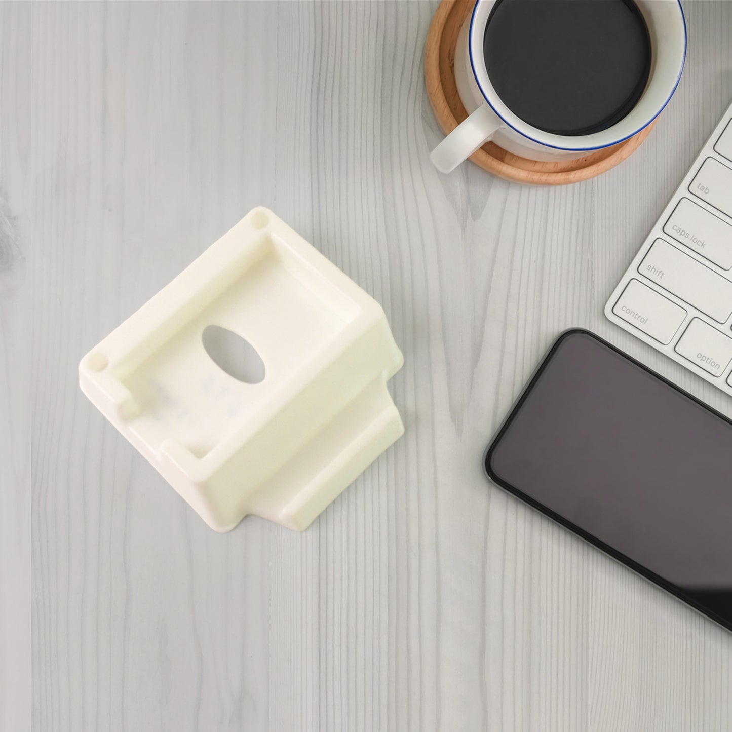 Plastic mobile phone stand holder by Wukusy, adjustable desktop accessory for hands-free device support.