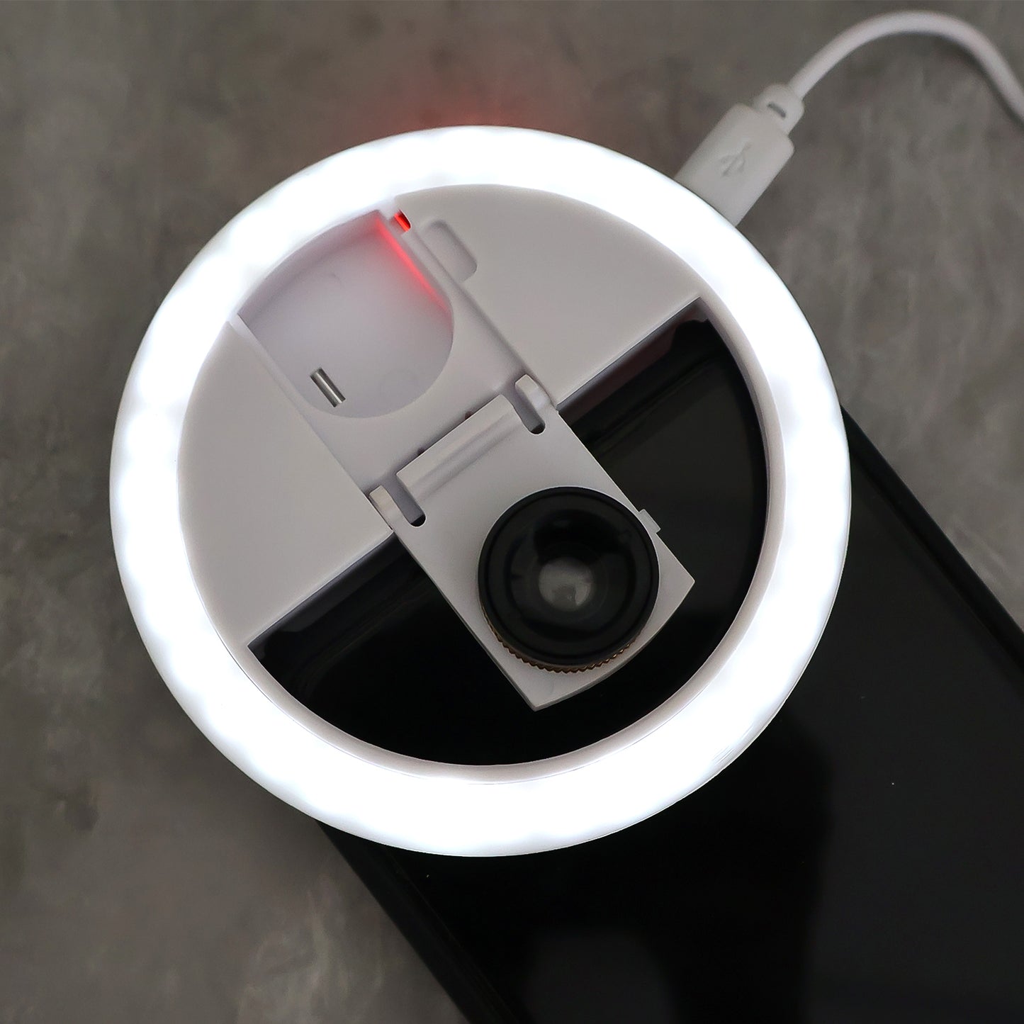 Wukusy selfie flash ring light with adjustable brightness, designed for mobile phones to enhance photo lighting.