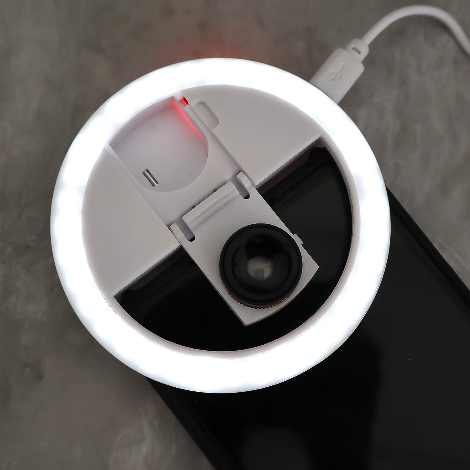 Wukusy selfie flash ring light with adjustable brightness, designed for mobile phones to enhance photo lighting.
