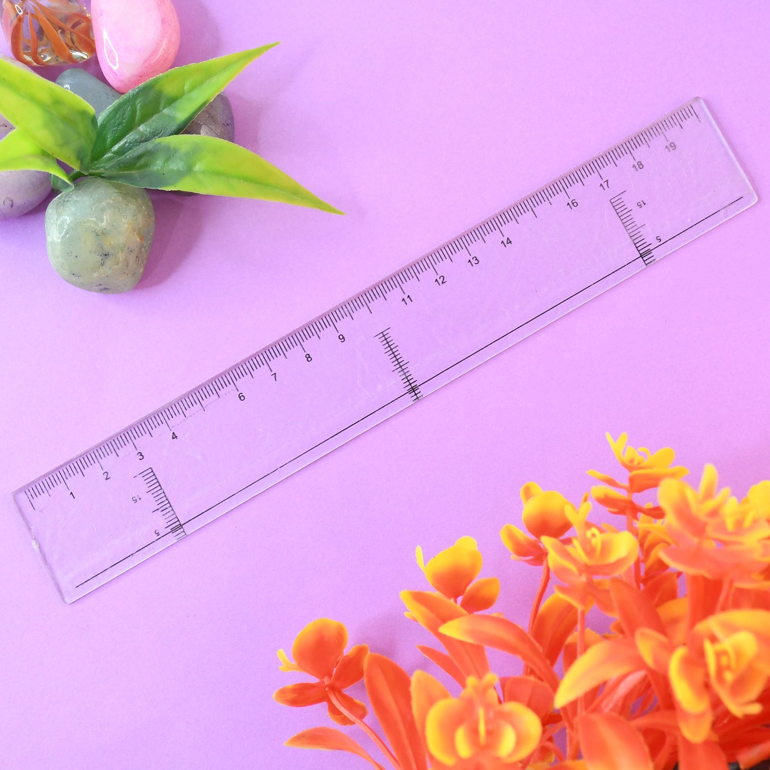 Wukusy 20 cm transparent plastic ruler for office use, showing clear measurement markings on a flat surface.