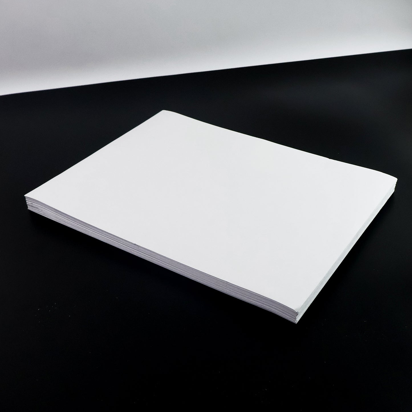 A4 size self-adhesive printable label sheets from Wukusy, showing 100 sheets of office label sheets with printed labels.