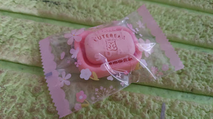 Cute soap-shaped eraser from Wukusy with a clear plastic case, perfect for office or school use.