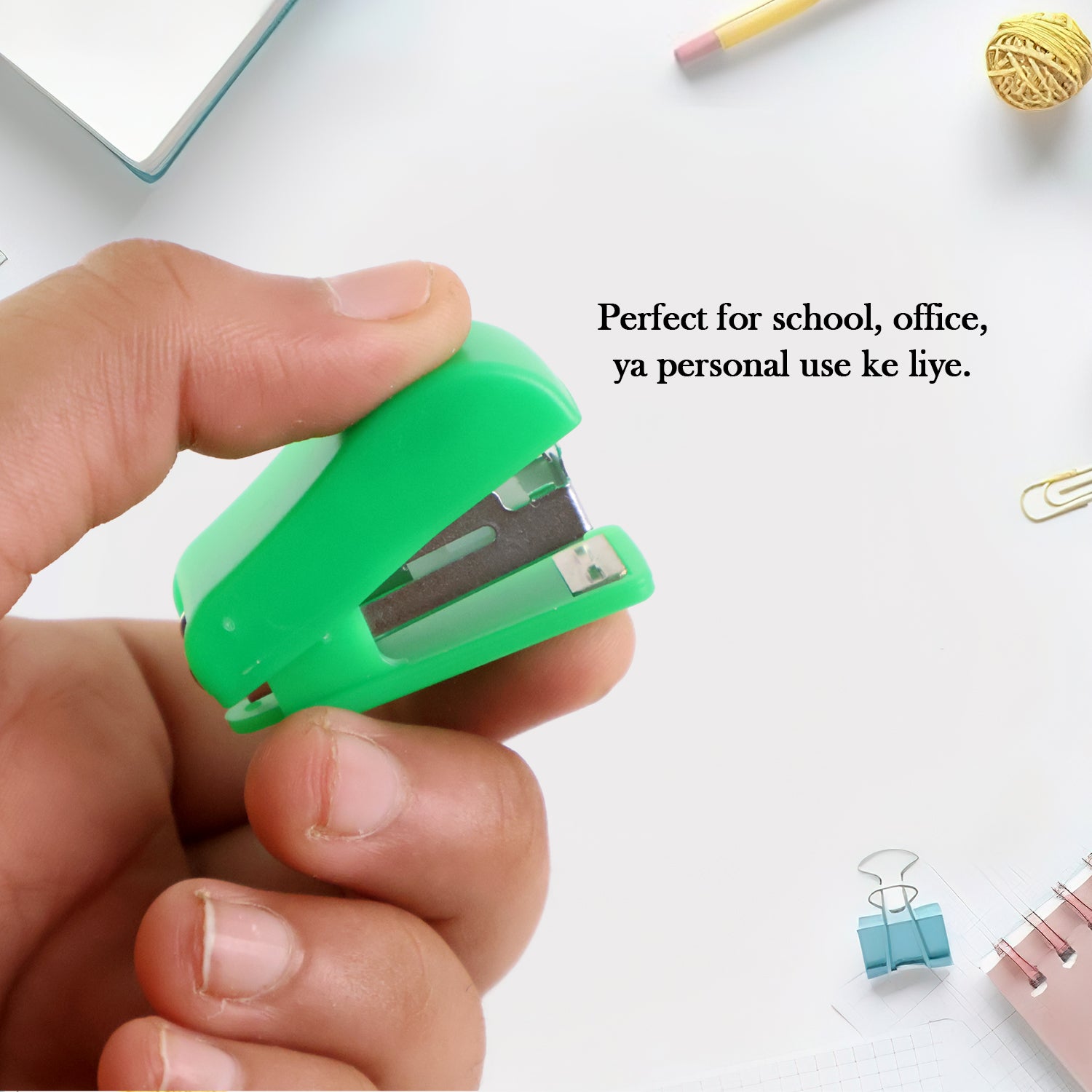 Wukusy mini office stapler with one strip of staples, compact and portable for quick paper securing.