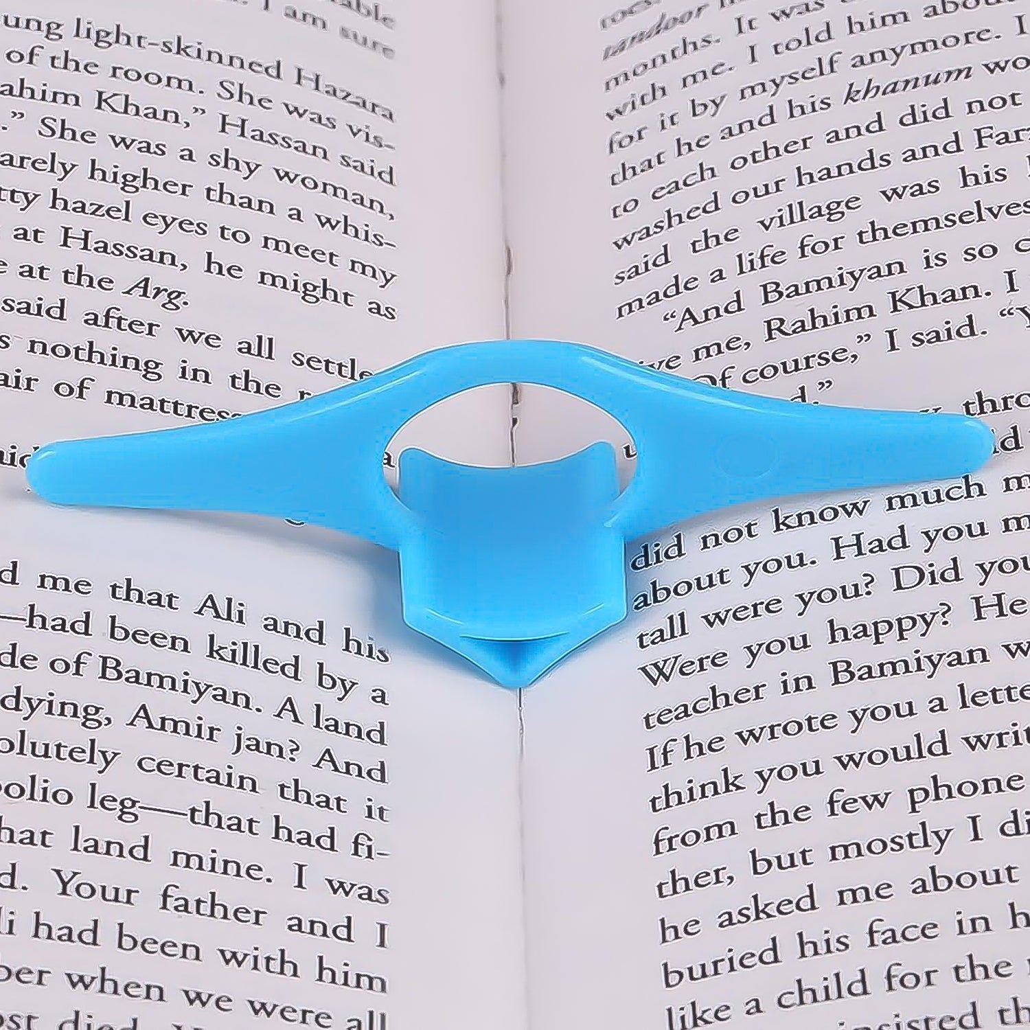 Wukusy office multi-function plastic thumb book support holder for holding pages during reading or studying.