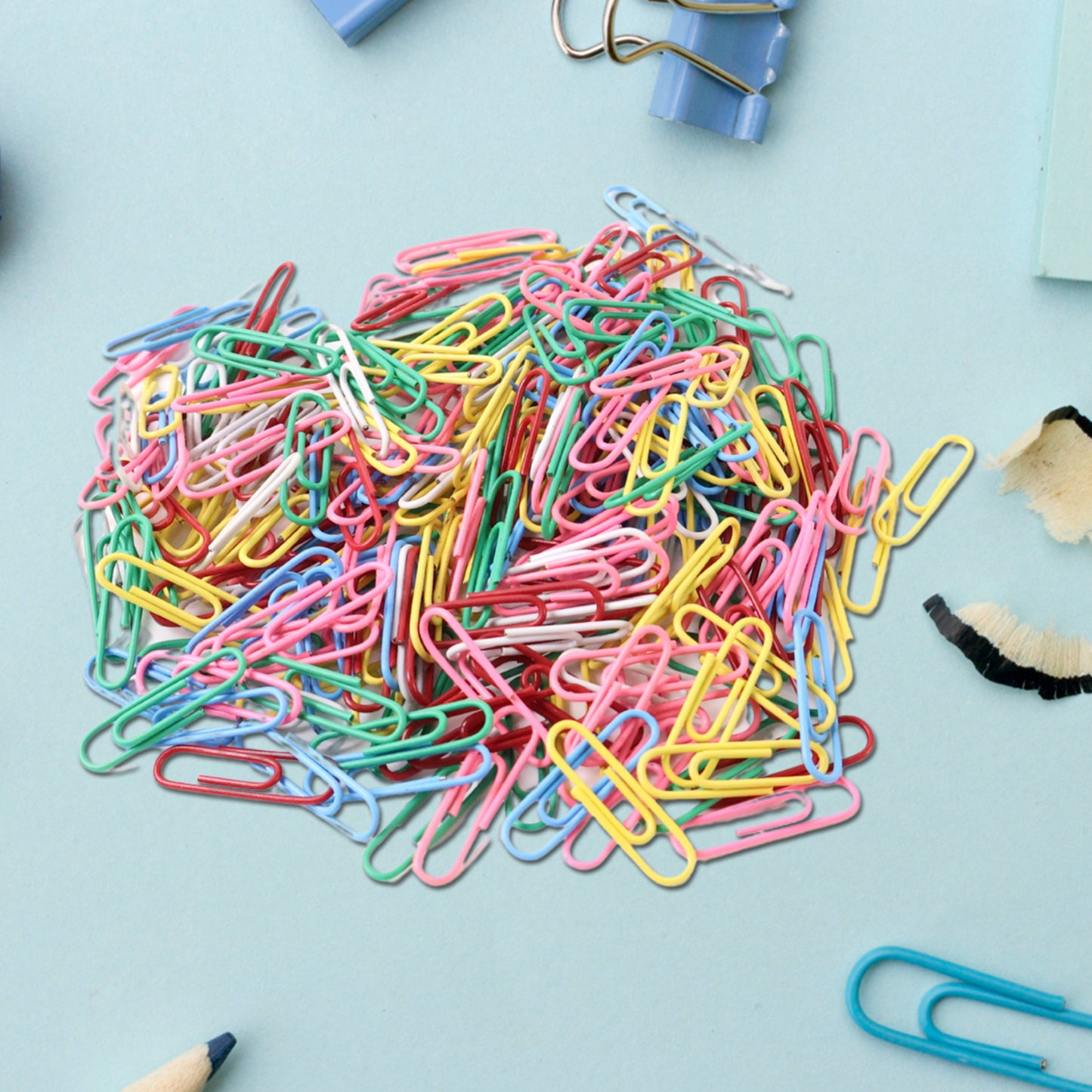 Multicolor-coated paper clips from Wukusy office set, approximately 250 pieces, arranged in a pile on a white background.