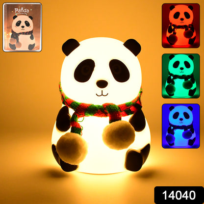 Wukusy Panda 7-color LED silicone touch lamp on office desk, colorful ambient lighting, portable and decorative for workspace.