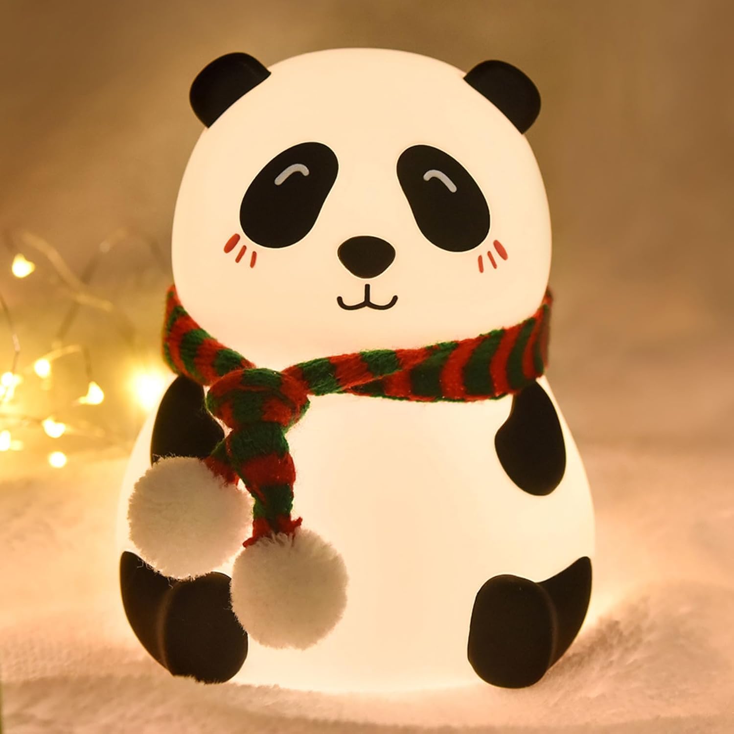 Wukusy Panda 7-color LED silicone touch lamp on office desk, colorful, soft glow, decorative lighting for workspace.