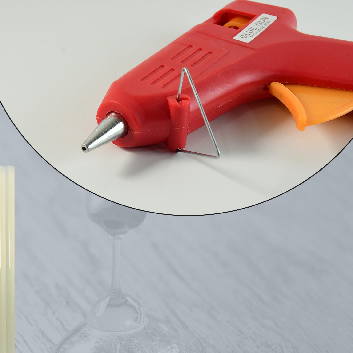 Wukusy professional 60 watt hot melt glue gun with on/off switch, designed for office use, with a glue stick ready for crafting or repairs.