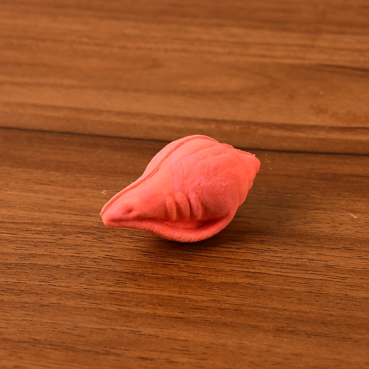 Set of 20 colorful Shankh shape eraser rubbers by Wukusy, ideal for office or school use, with vibrant mixed colors and unique design.