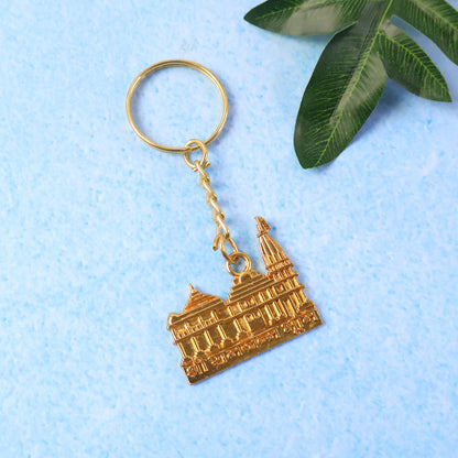 Golden metal Ram Mandir keychain by Wukusy, featuring intricate design and durable craftsmanship.