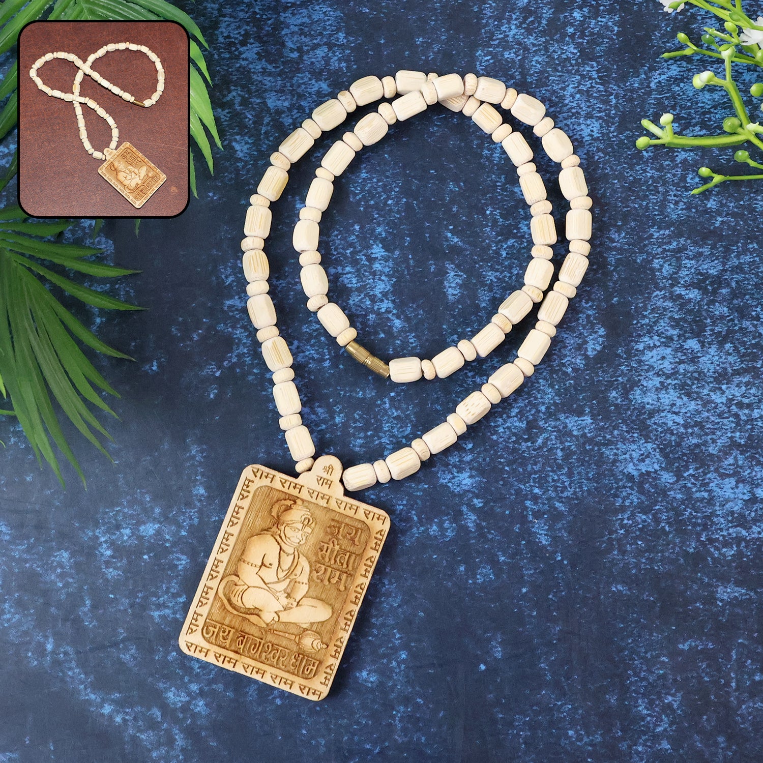 Wooden Hanuman pendant mala from Wukusy, featuring a detailed carved Hanuman figure on a string of beads.