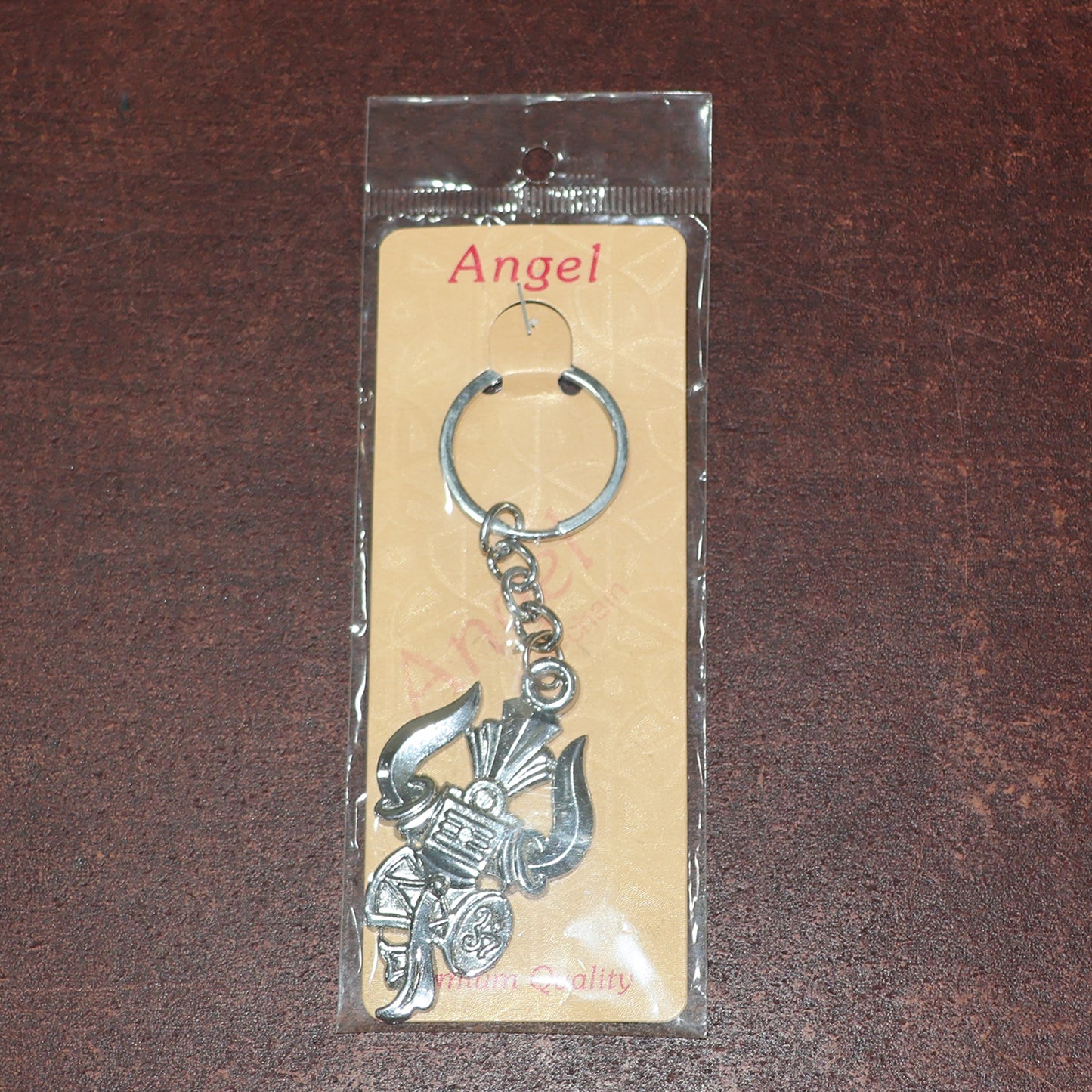 Silver keychain featuring Trishul, Damru, and Shiv symbol by Wukusy, crafted for spiritual symbolism and everyday use.