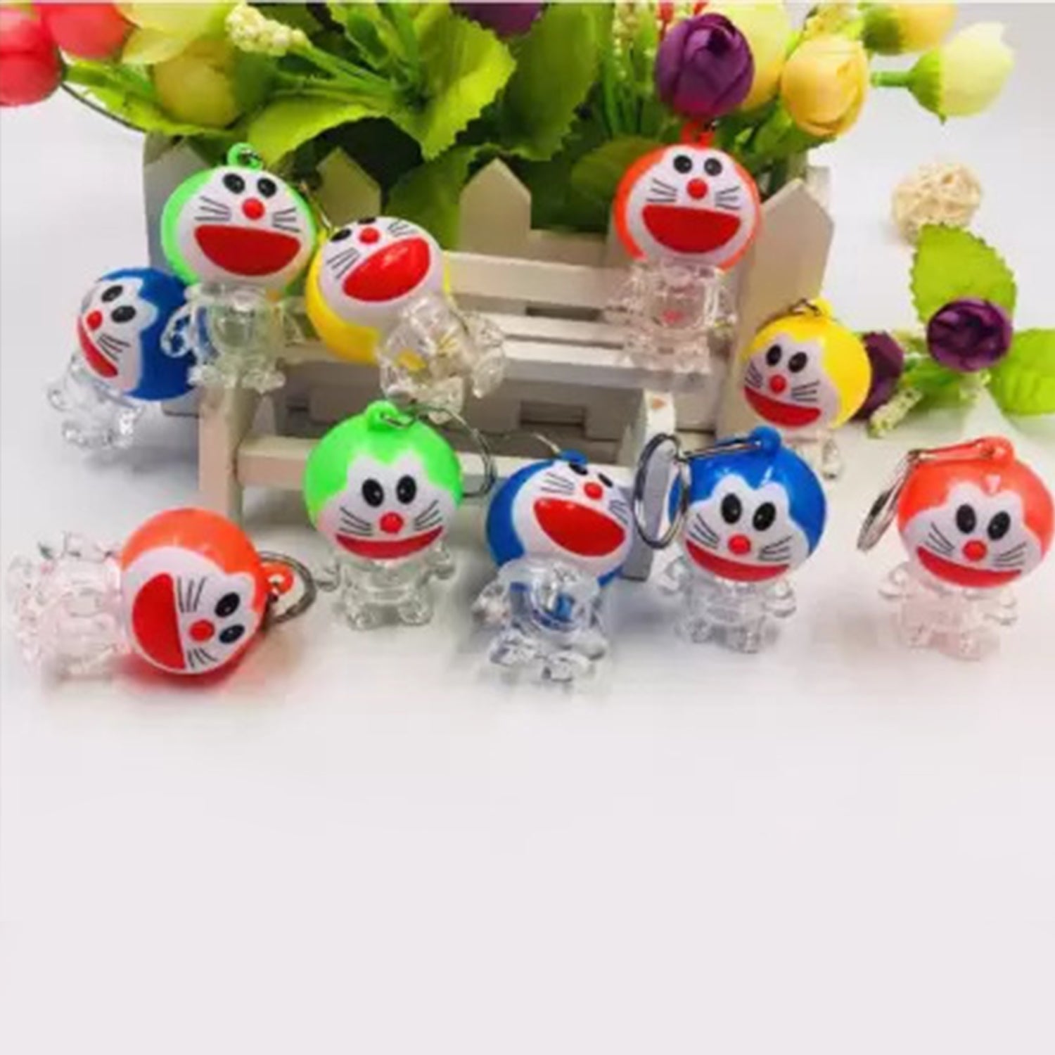 Wukusy Doremon Lightning Keychain with two-colored lightning design, toy accessory, small and portable keychain for fans.