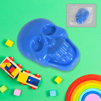 Small Wukusy 1928 Pull Back Skull Toy for kids, featuring a detailed skull design and fun pull-back mechanism.