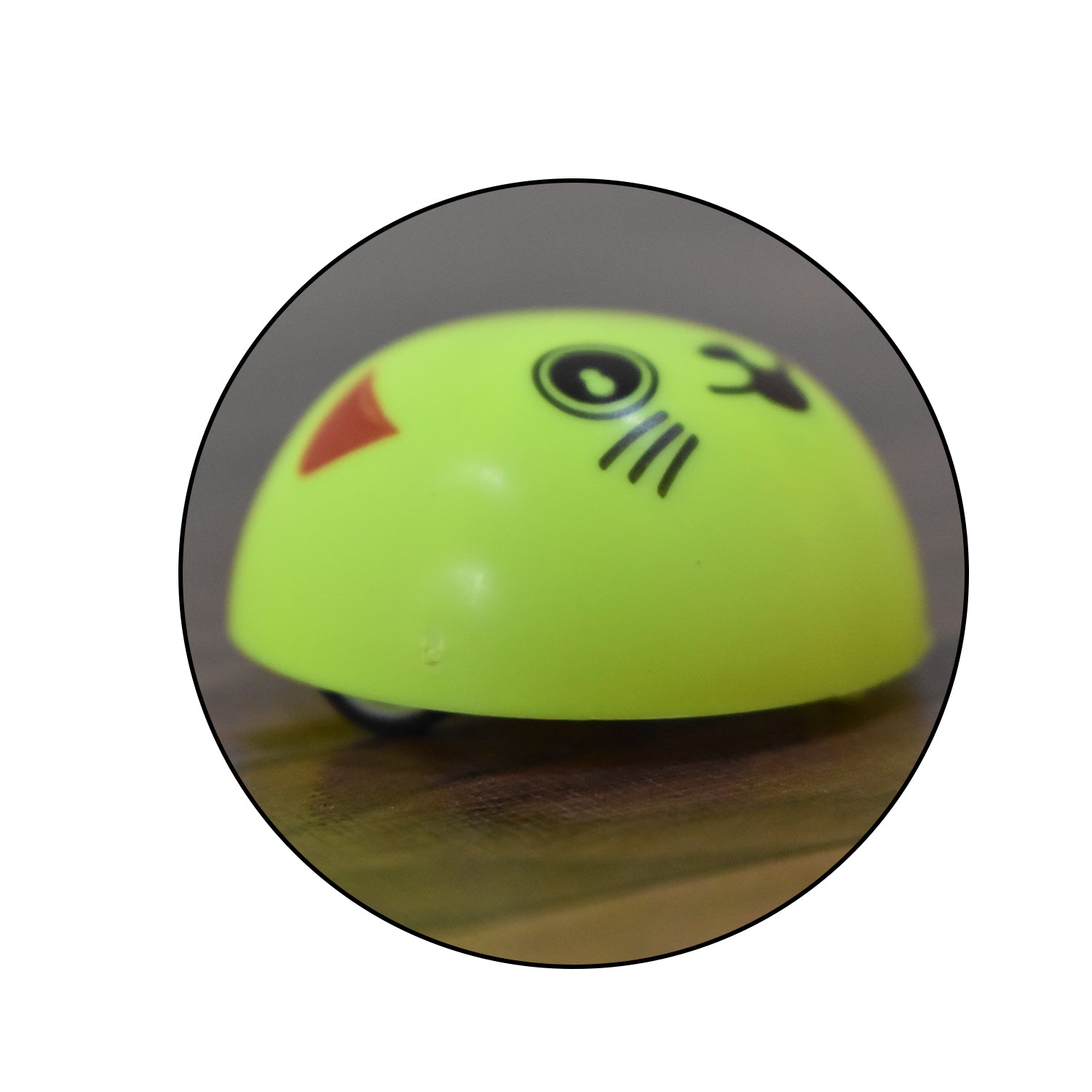 Wukusy Pull Back Smiley Toy, colorful plastic toy with a smiling face, designed for kids to pull back and watch it race forward.