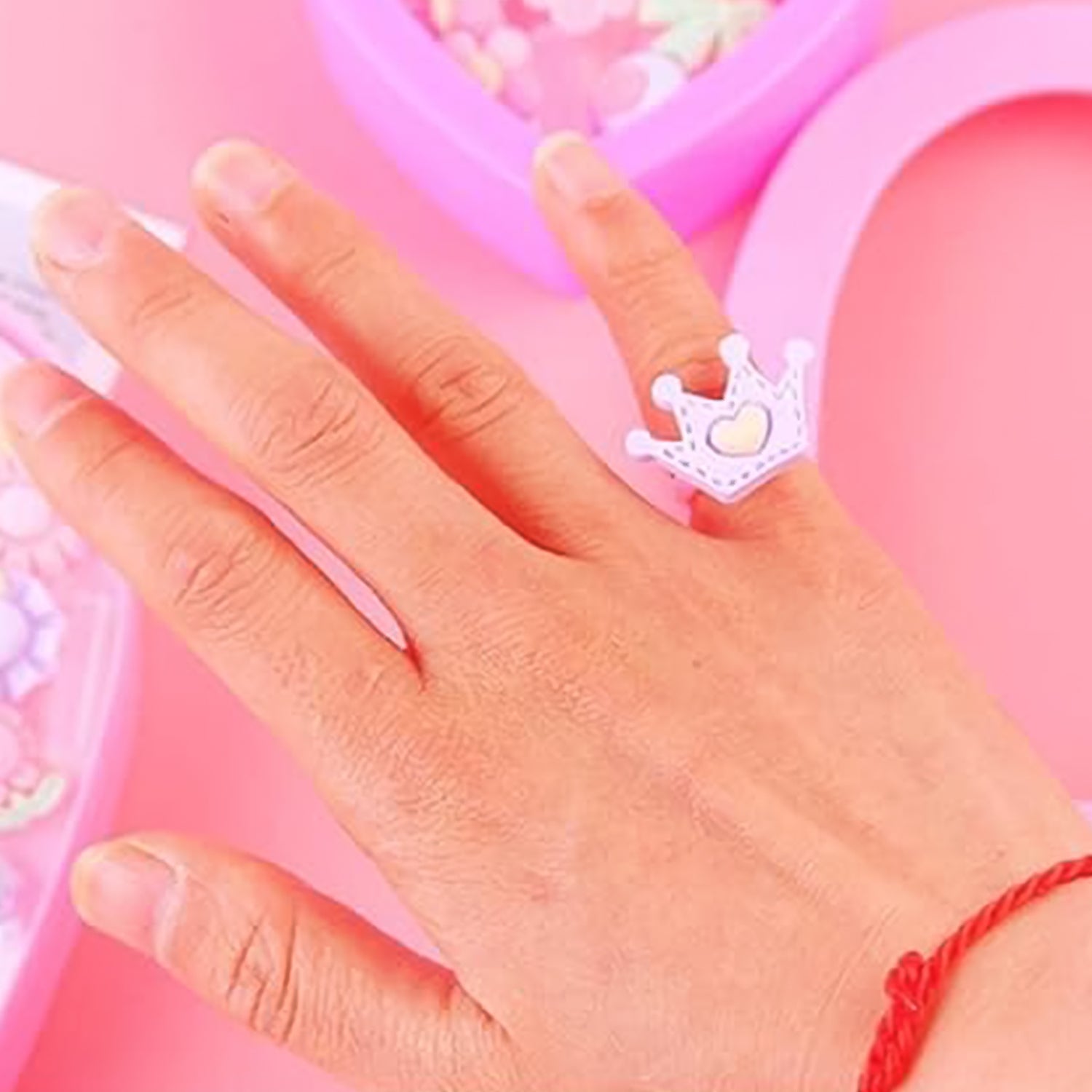 Set of 35 playful decorative rings for children by Wukusy in a heart-shaped storage box, colorful and fun toy jewelry for kids.