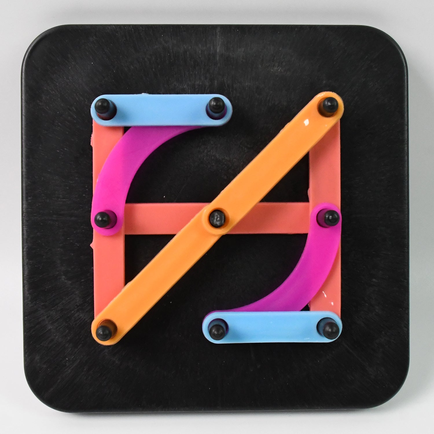 Wukusy alphabet construction puzzle with colorful alpha-numeric pieces for kids' educational toy and motor skills development.