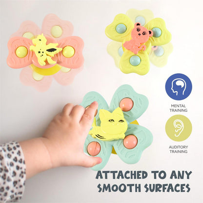 Wukusy Buzzy Baby Spinner Toy Set with three colorful spinning toys attached to suction cups for babies to play with