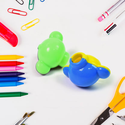 Colorful cartoon money-shaped pencil top toy from Wukusy, featuring a fun, mix of bright colors and playful design.