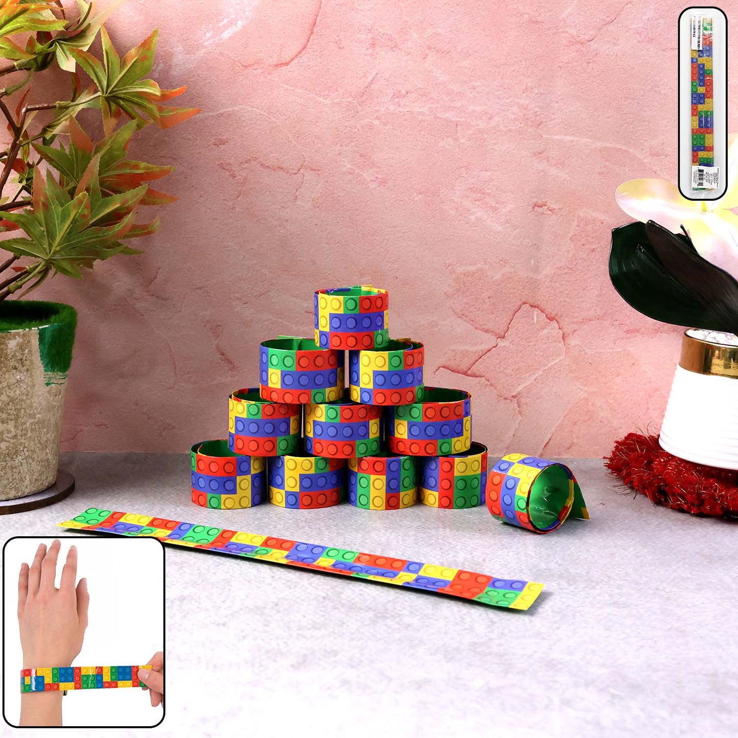 Set of 12 colorful Snap Slap bracelets by Wukusy, flexible plastic toy wristbands with snap closures in bright, vibrant colors.