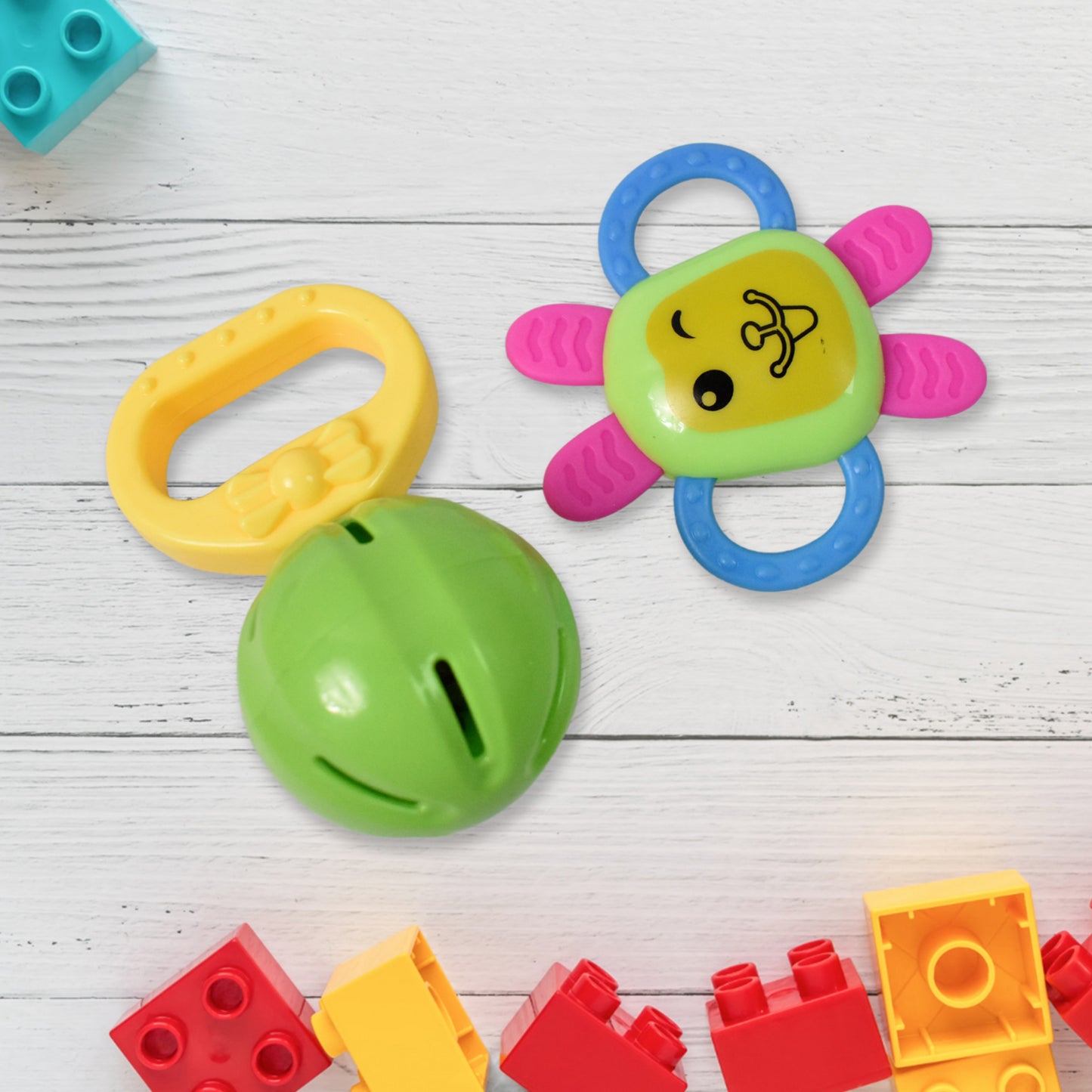 Set of 8 Wukusy Kinder Rattles with plastic, non-toxic shake and grab balls for babies, including teethers and sensory toys.