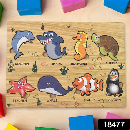Wukusy seawater animal wooden puzzle set for kids, educational toy with colorful marine animal pieces on a learning board.