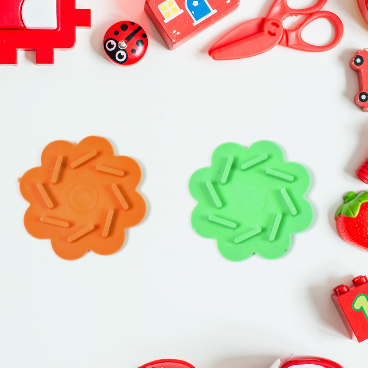 Small Wukusy Magic Air Spinner toy, plastic spinning toy with vibrant colors, designed for fun and entertainment.