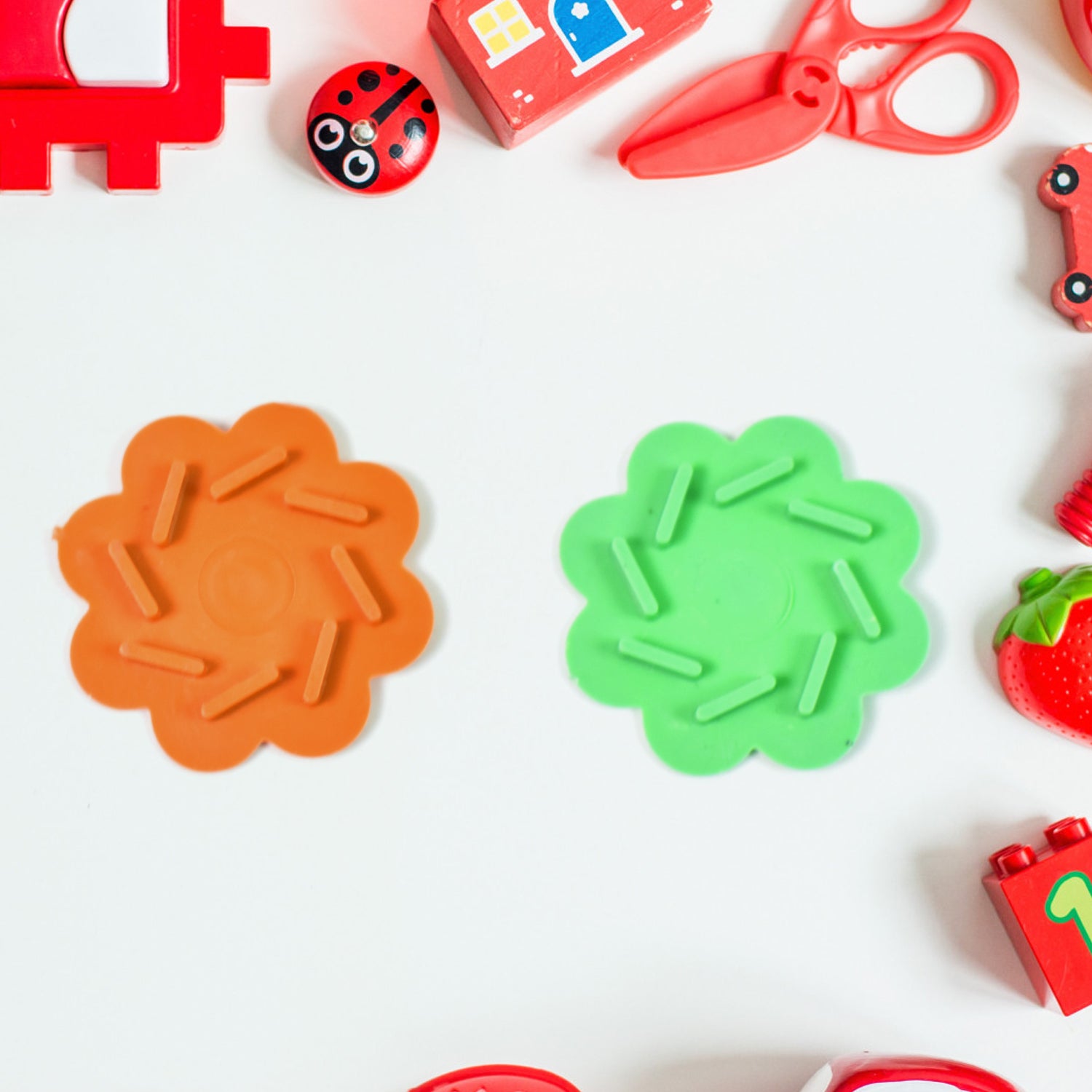 Small Wukusy Magic Air Spinner toy, plastic spinning toy with vibrant colors, designed for fun and entertainment.