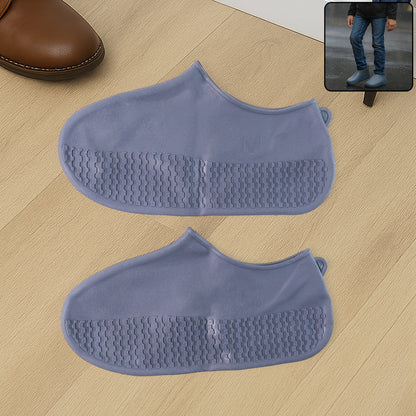 Wukusy grey silicone rain boot covers, waterproof and non-slip, foldable and reusable, for travel footwear protection.