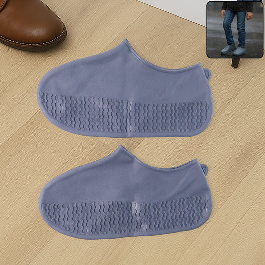 Wukusy grey silicone rain boot covers, waterproof and non-slip, foldable and reusable, for travel footwear protection.