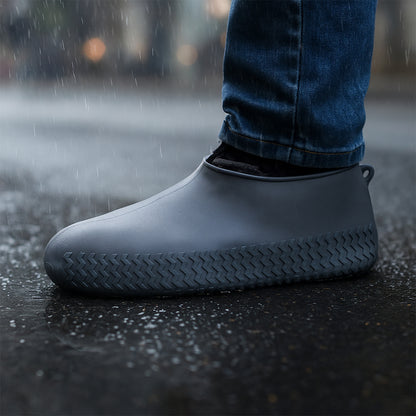 Grey Wukusy silicone rain boot covers, waterproof and anti-skid, foldable reusable travel shoe protectors in a pair.