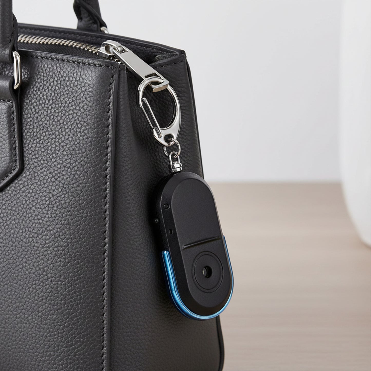 Wukusy travel personal safety alarm keychain with loud siren and LED light for emergency safety and security.