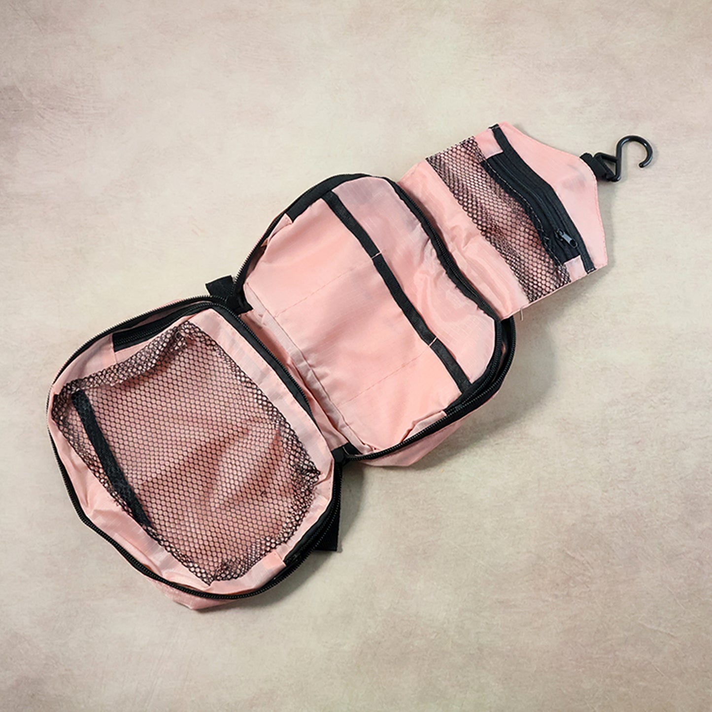 Wukusy Premium Travel Mate hanging toiletry bag with multiple compartments for organized travel essentials.