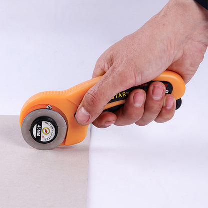 Wukusy 9048 manual sewing roller cutter rotary blade for fabric cutting, hardware tool with sharp circular blade in a close-up image.