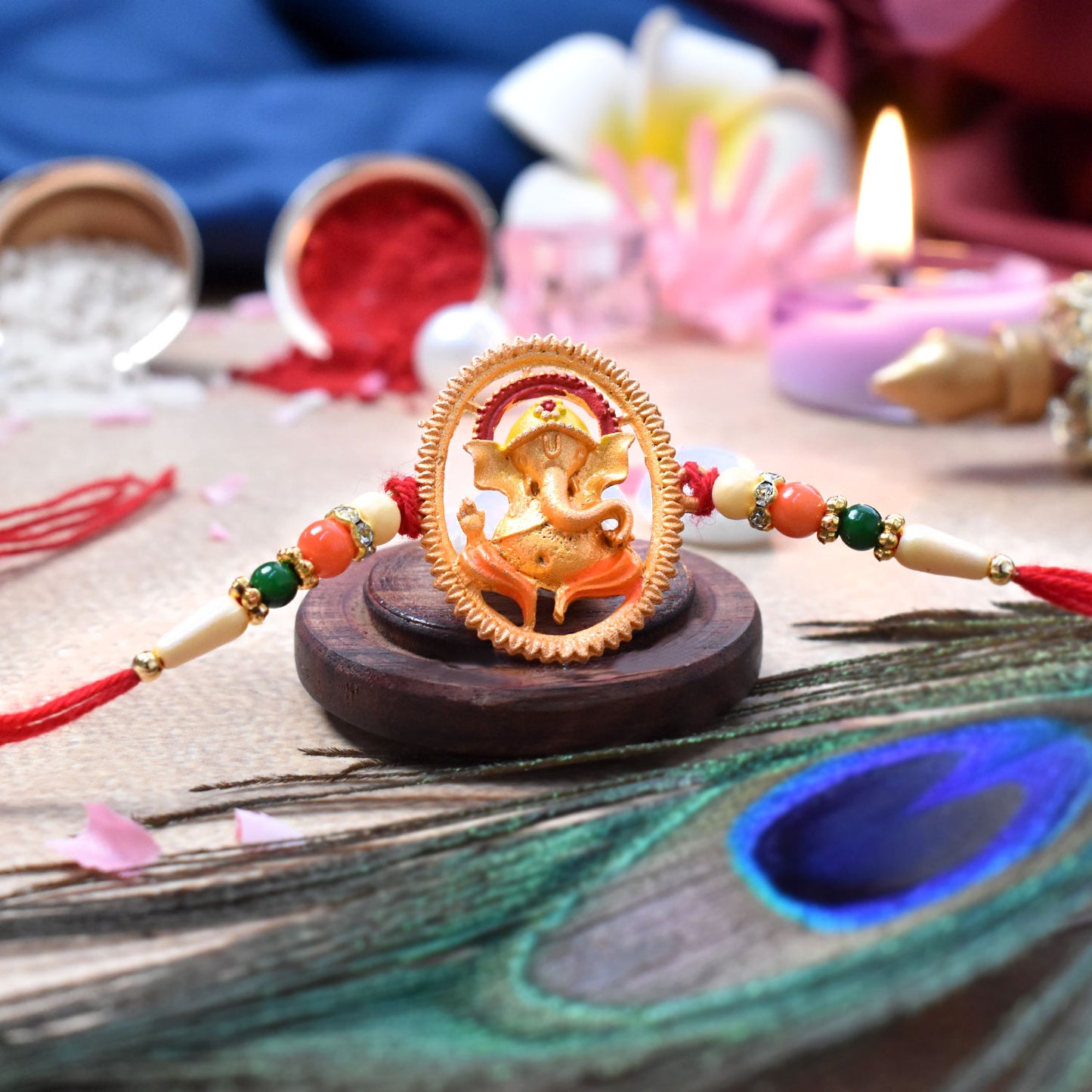 Colorful Ganesha designer Rakhi by Wukusy, featuring intricate fashion details and traditional motifs for festive celebrations.