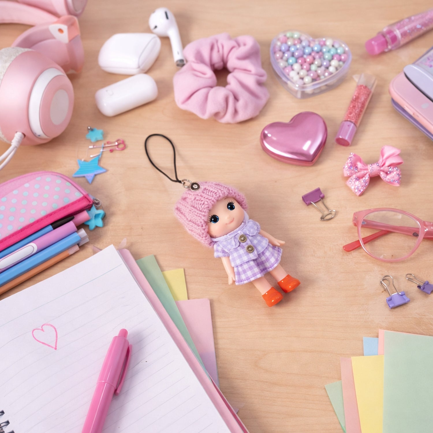 Set of six colorful Wukusy mini doll hanging keychains, featuring cute and varied designs for accessories or decor.