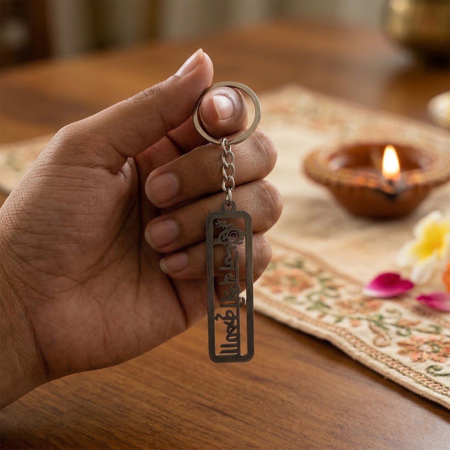 Metal Jay Shri Krishna engraved keychain by Wukusy featuring detailed Krishna design on a durable metal keyring.