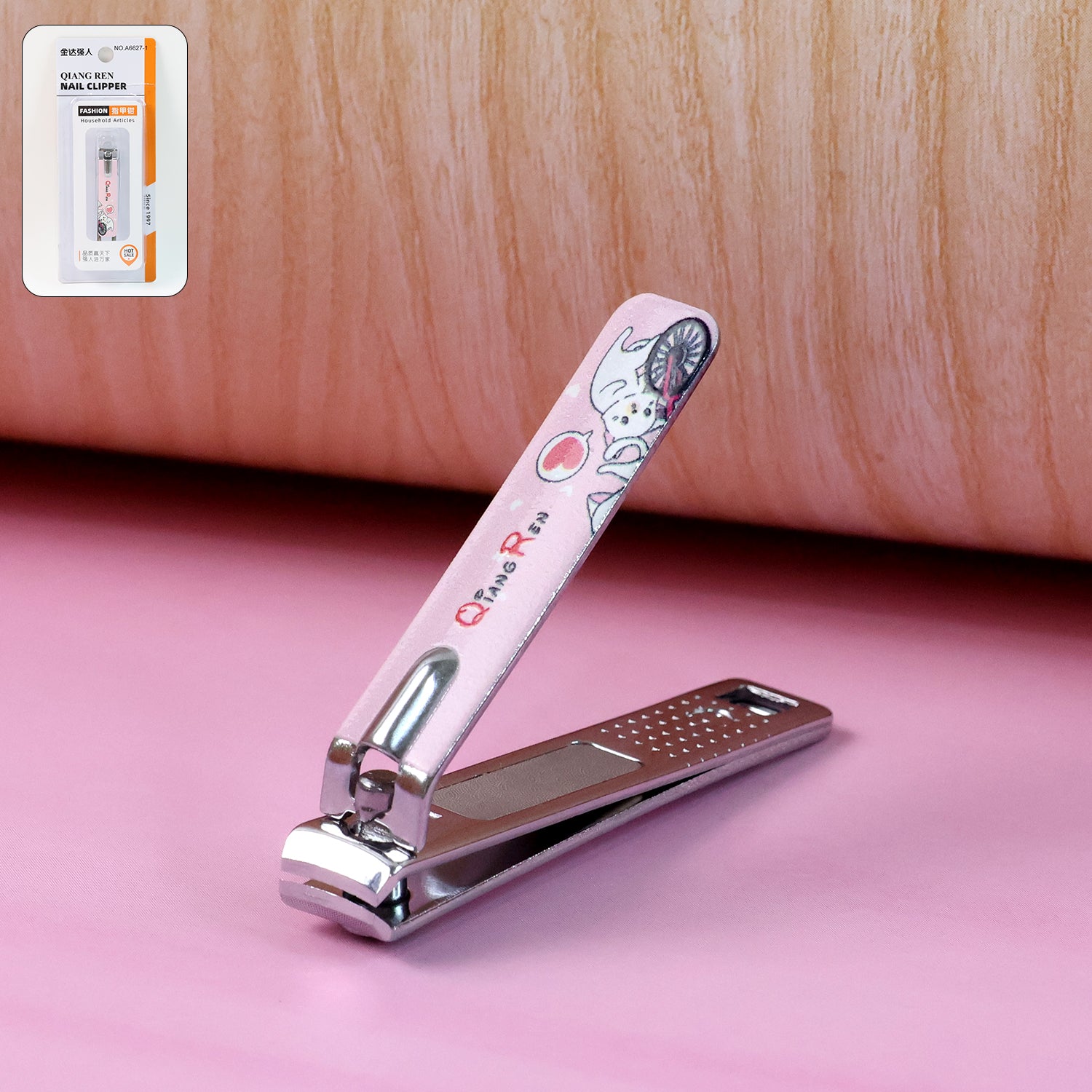 Wukusy stainless steel nail clipper with built-in nail catcher and nail file, designed for precise and hygienic nail grooming.