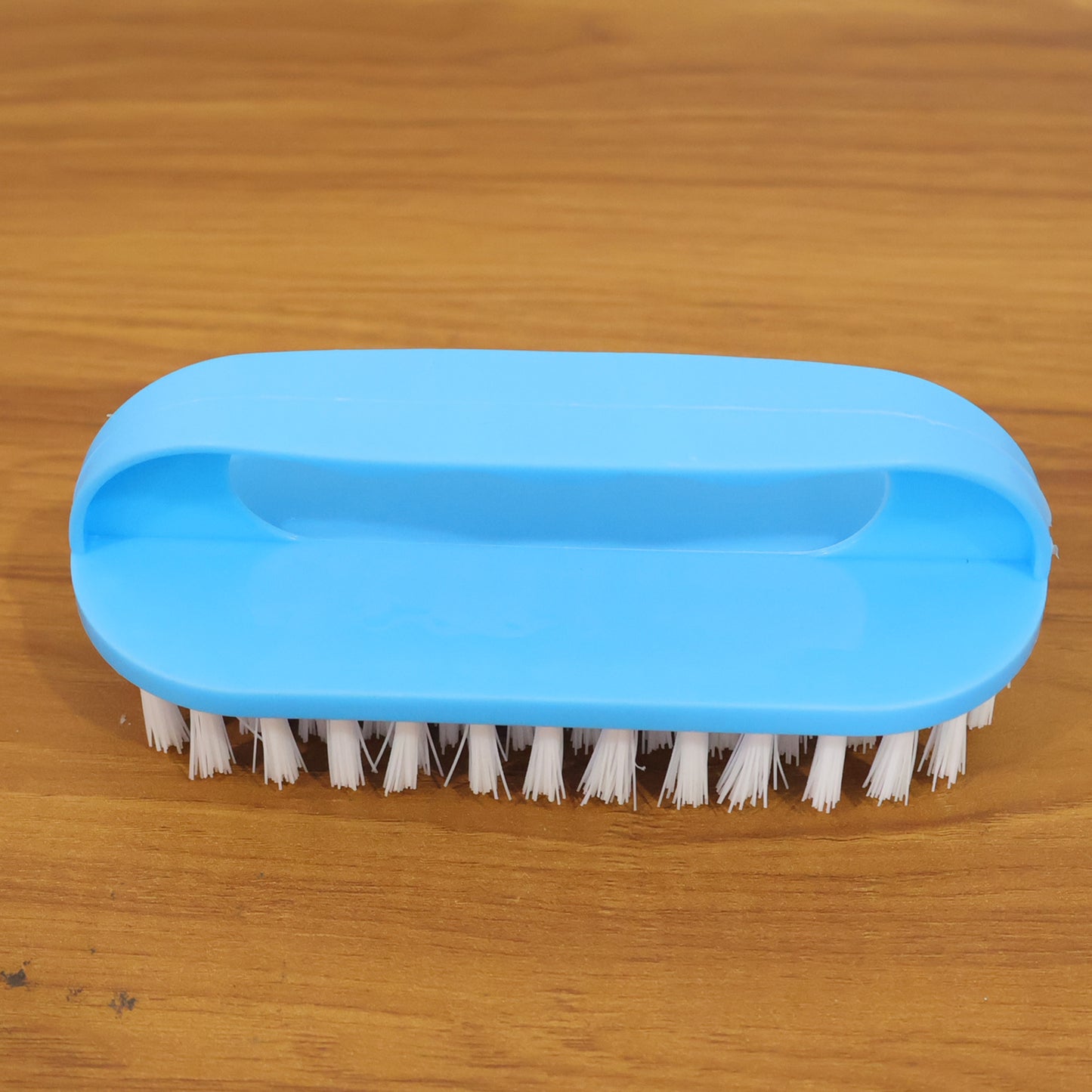 Wukusy heavy-duty handheld cleaning scrub brush with stiff bristles for scrubbing surfaces and removing dirt.