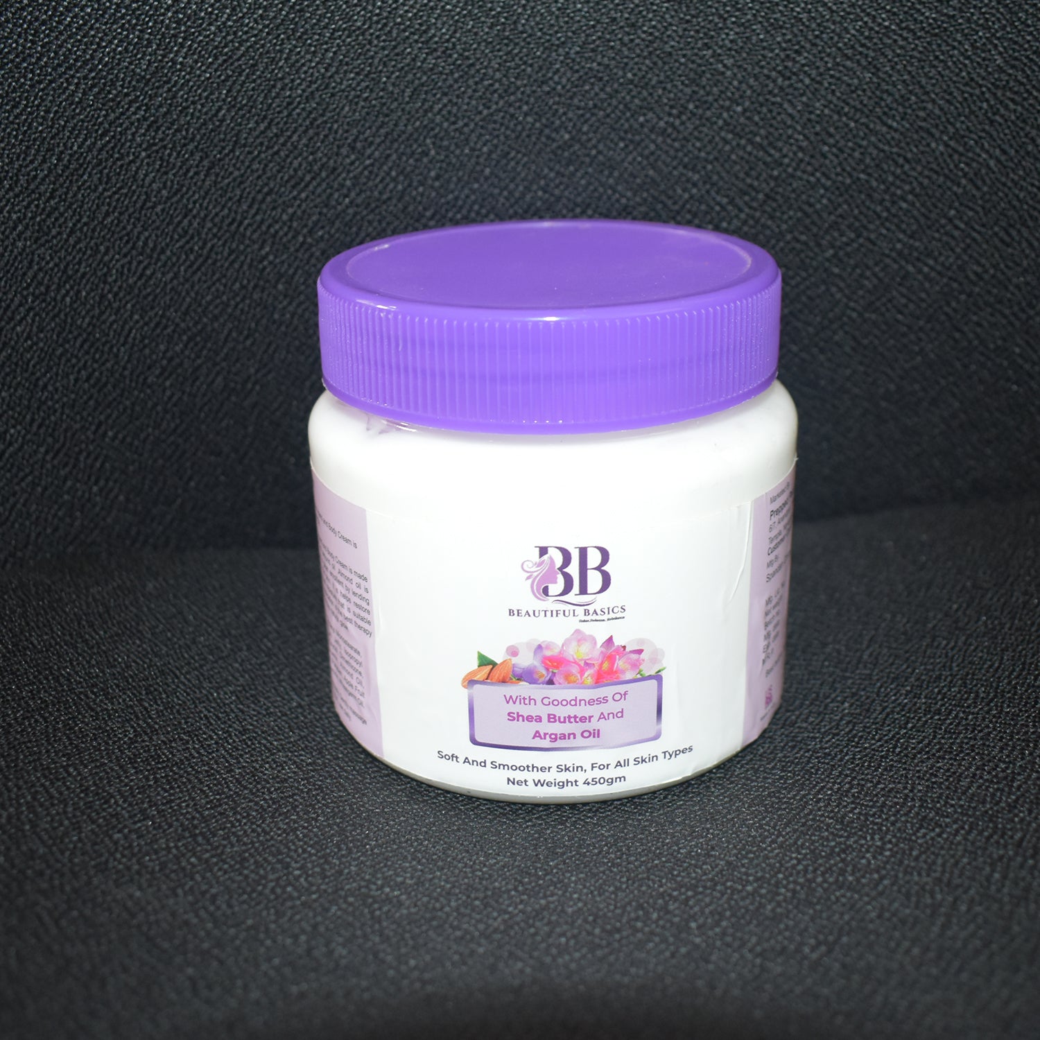 Wukusy Beautiful Basics Shea Butter and Argan Oil Body Cream in 450g jar, smooth creamy texture for nourishing skin.