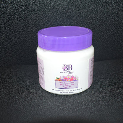 Wukusy Beautiful Basics Shea Butter and Argan Oil Body Cream in 450g jar, smooth creamy texture for nourishing skin.