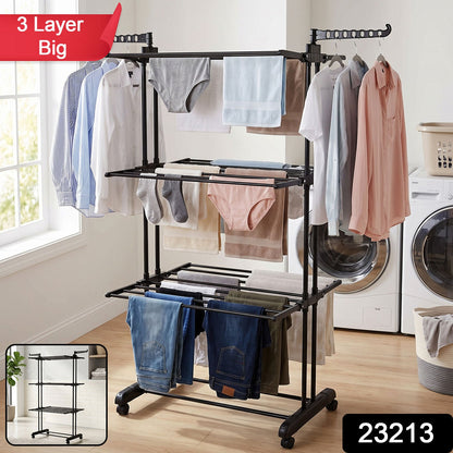 Wukusy metal expandable garment rack with 3 layers and wheels, used for drying and organizing clothes.